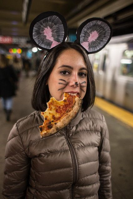 NYers never get tired of Pizza Rat, even if Pizza Rat has become bored of humanity's idle gluttony. If you don't have rat ears, you can substitute by gluing real rats to your noggin. If you don't have the skills to catch two rats on short notice, you can just drape yourself in pizza.